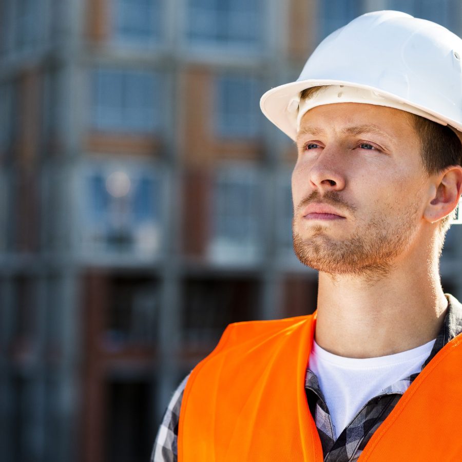 close-up-portrait-construction-engineer-looking-away close-up-portrait-construction-engineer-looking-away